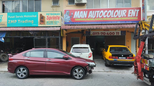 Mengetuk & mengecat Man autocolour ent